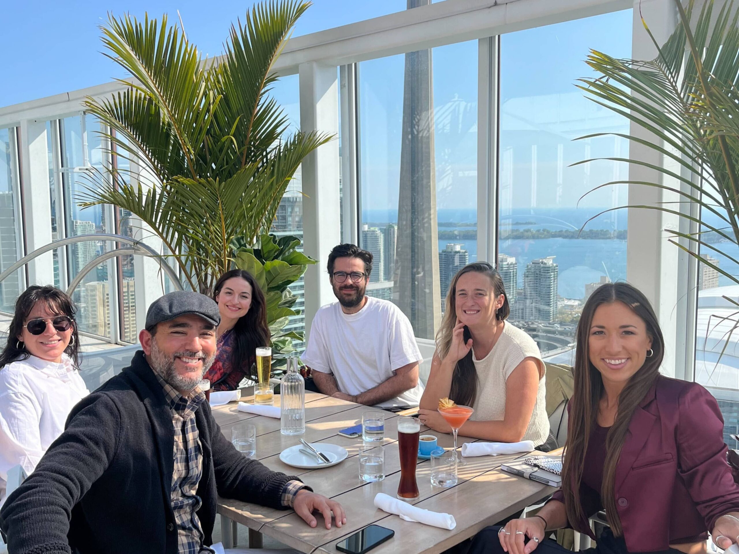 The creative team at lunch with a view of Toronto 
