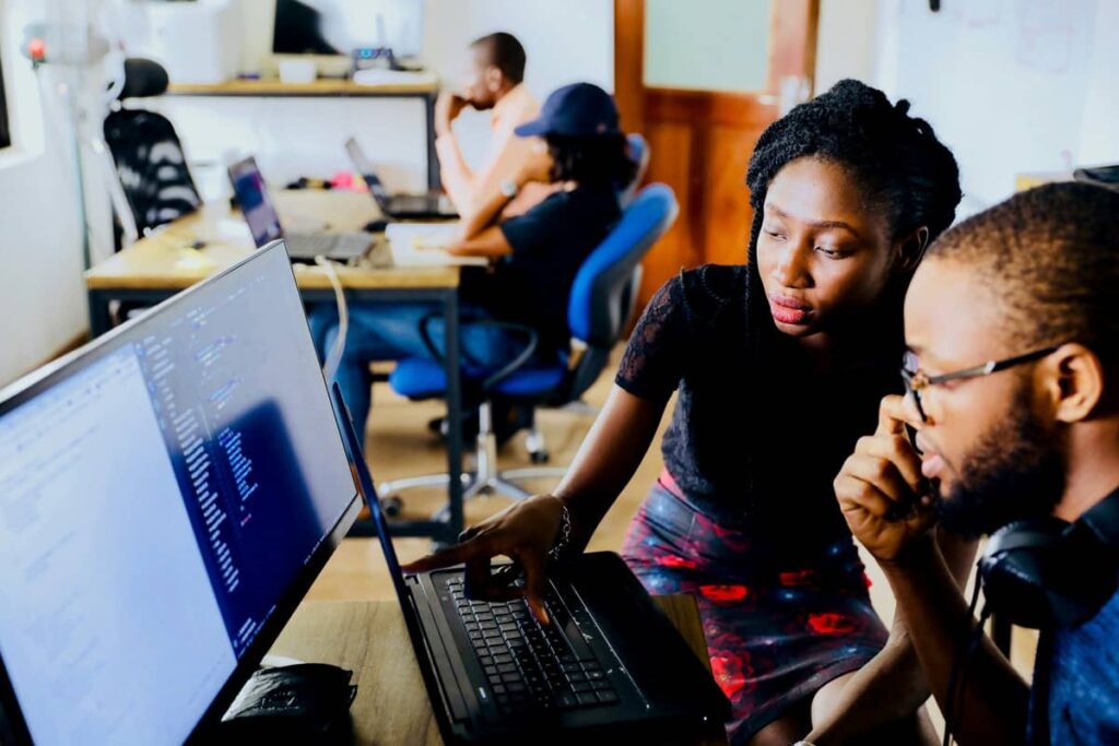 students looking at a computer screen together