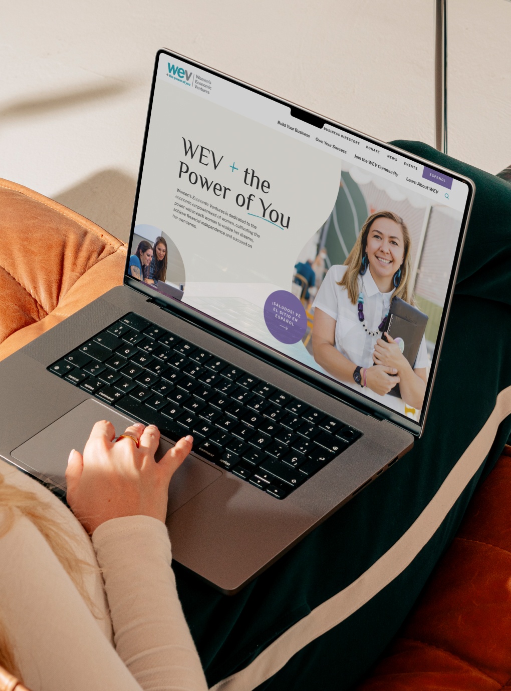 WEV nonprofit web design - homepage in a laptop mockup