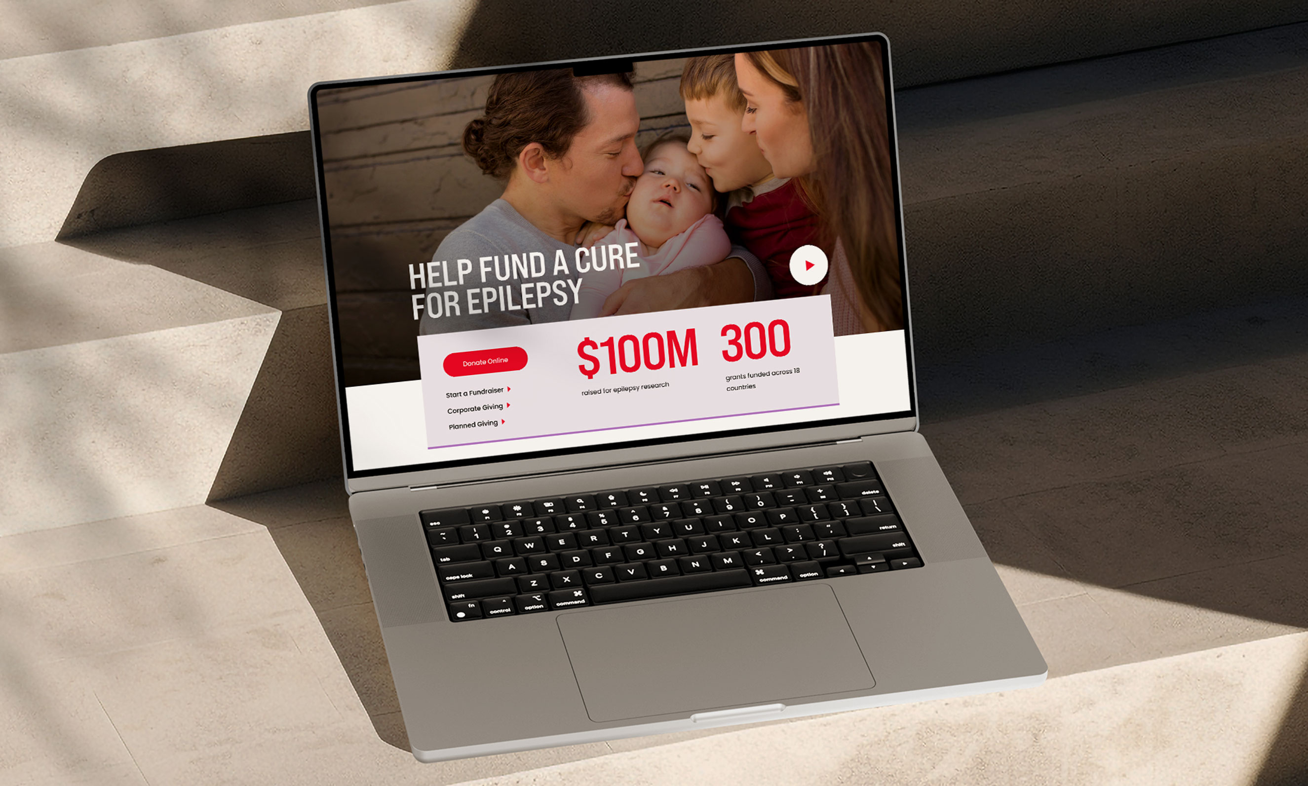 Cure Epilepsy responsive website design page in a laptop mockup