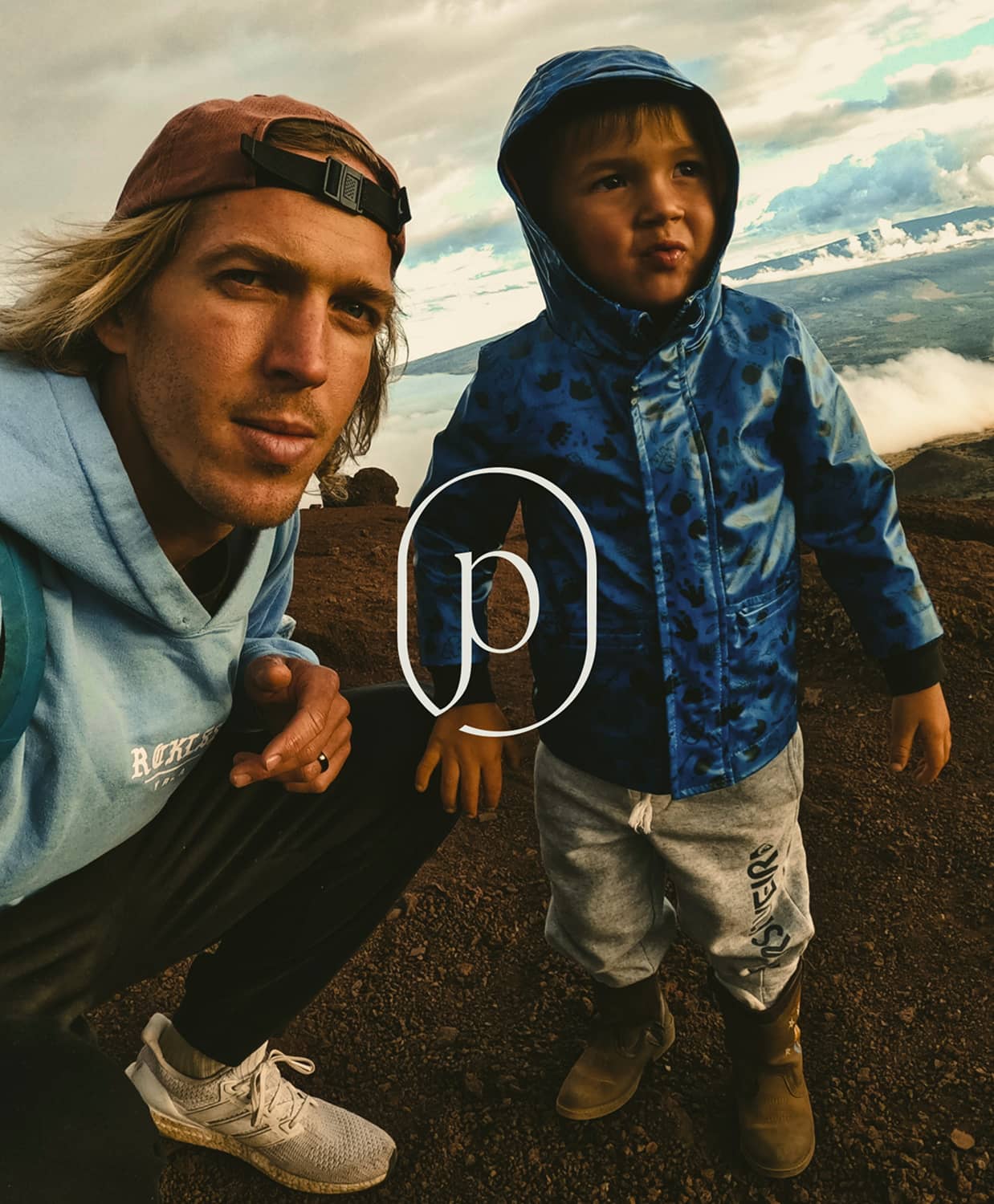 Logo mark overlaying example of image of young boy and man