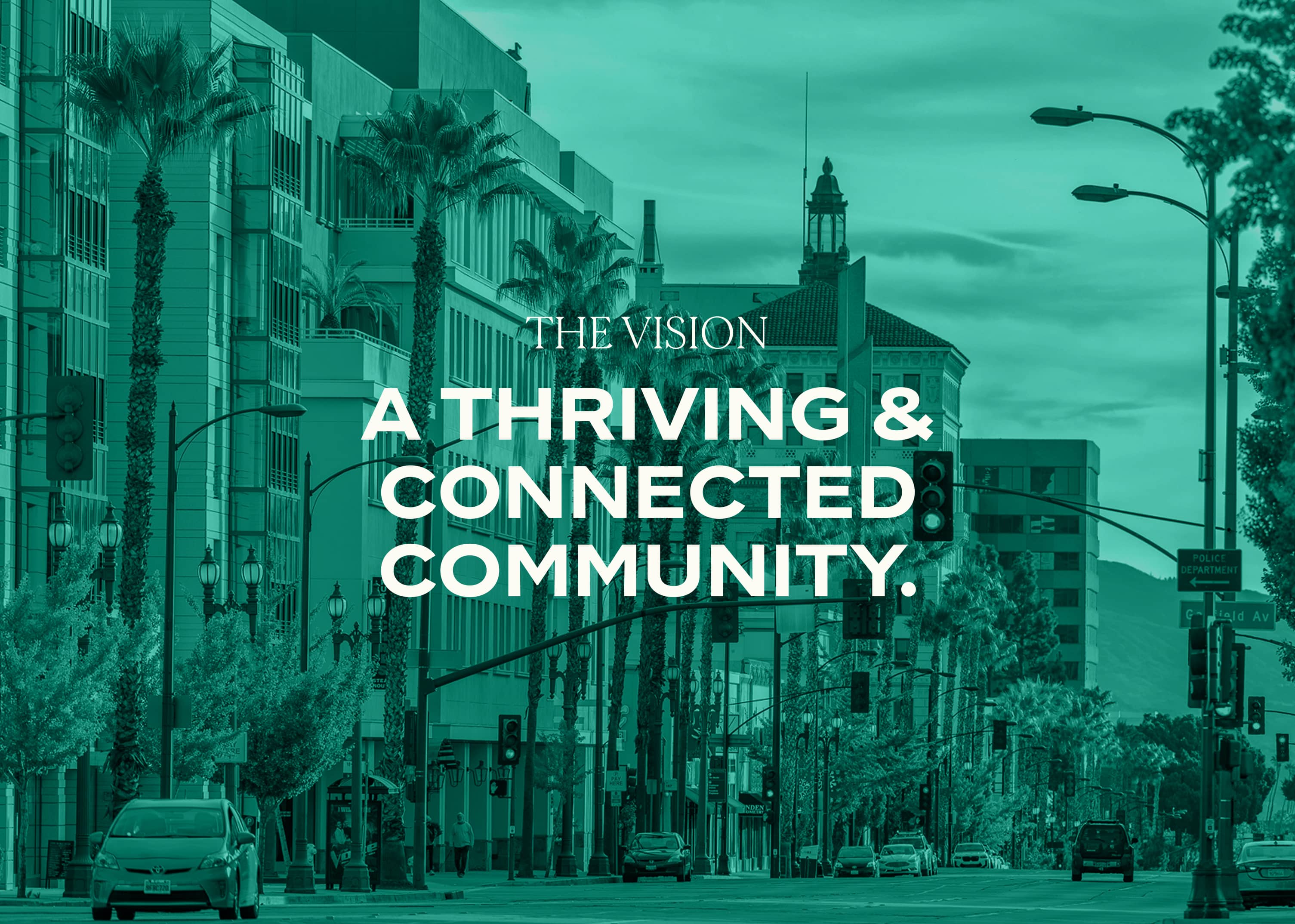 PCF Mission statement overlaying aqua filtered image of a busy street