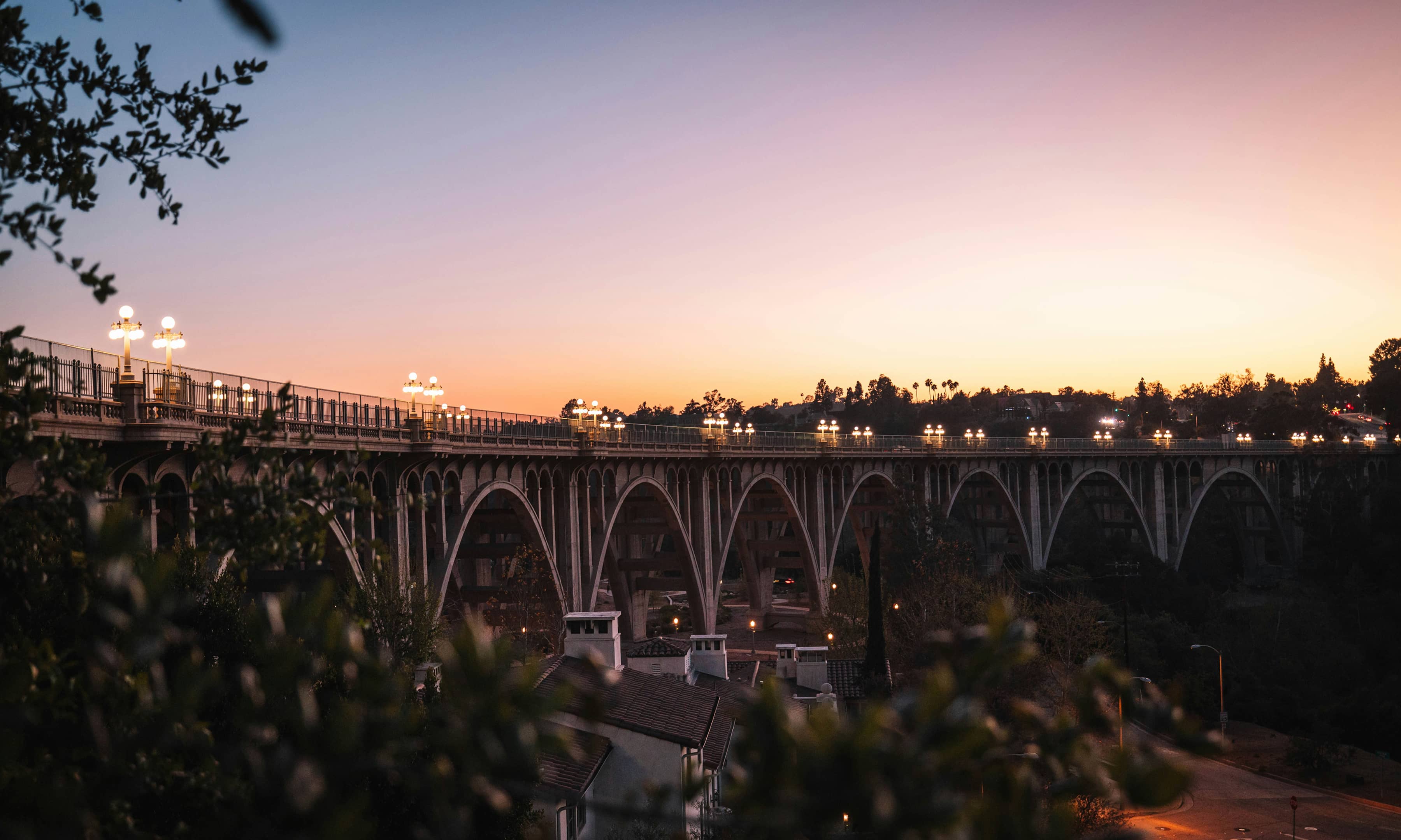 Image of sunset view of arching bridge