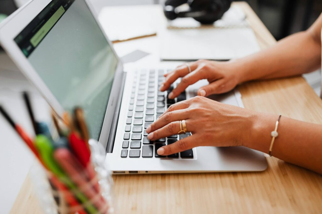 Marketing manager entering content on a website