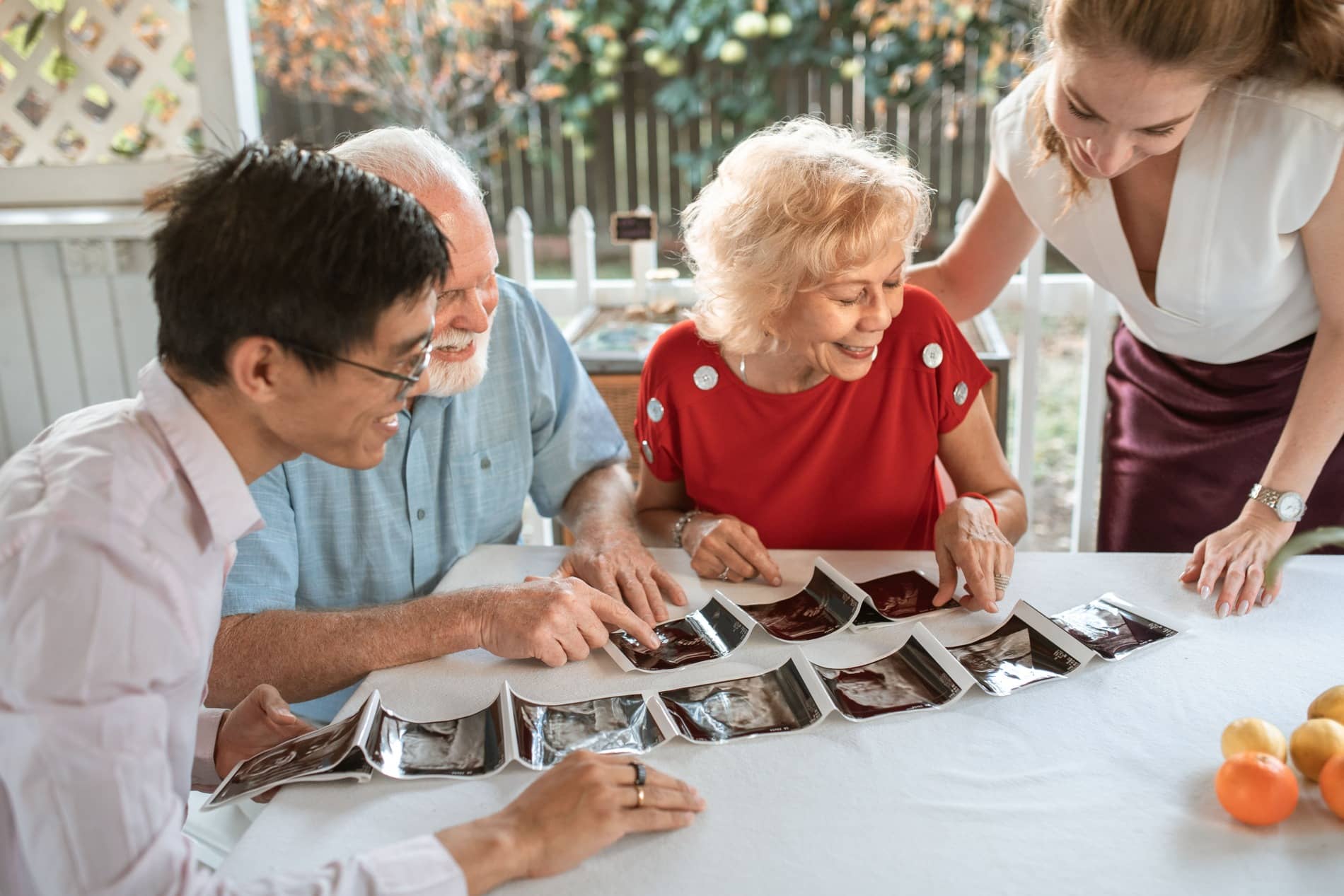 Different family generations gathering together and thinking of the future.