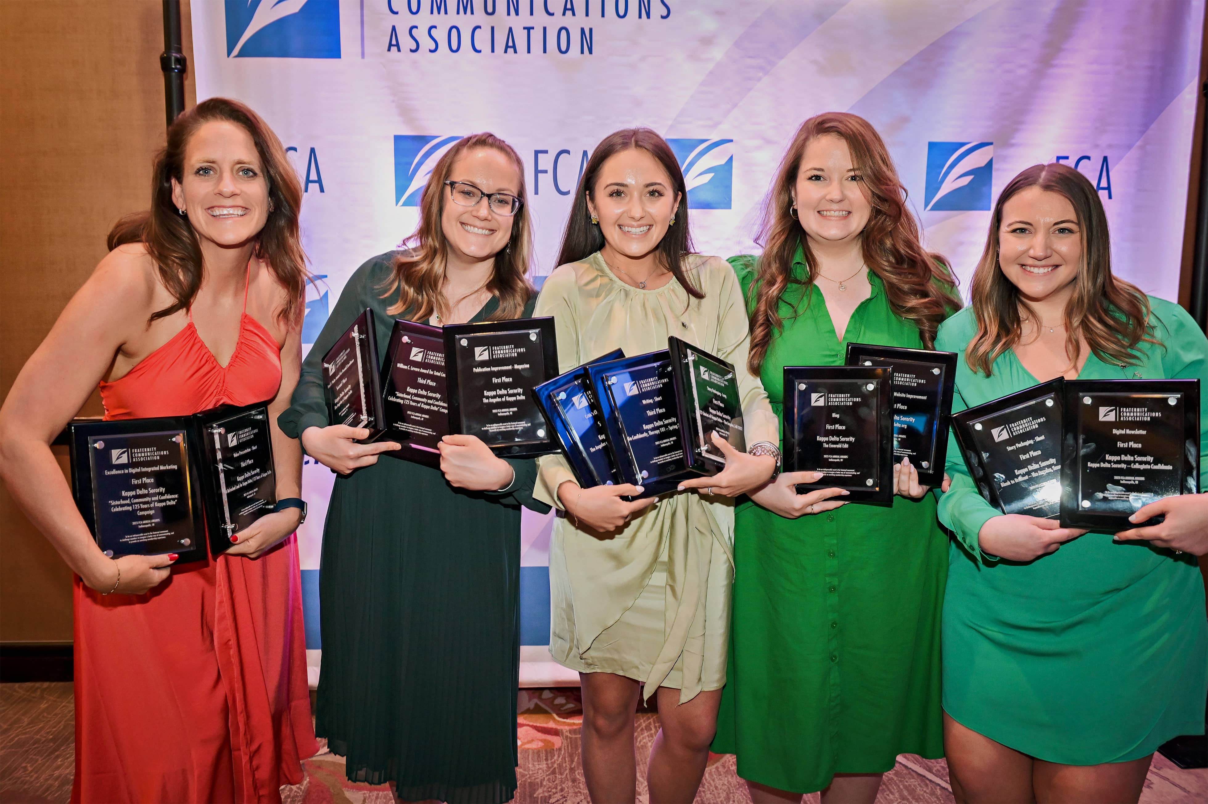 Kappa Delta holding all of their awards from the Fraternity Communications Association’s Annual Conference